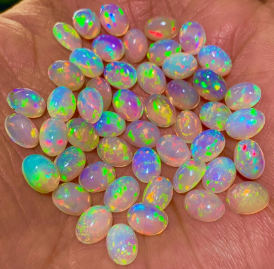 JLUXS OVAL CUT 7X9MM NATURAL ETHIOPIAN OPAL LOOSE GEMSTONE
