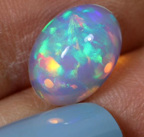 JLUXS OVAL CUT 7X9MM NATURAL ETHIOPIAN OPAL LOOSE GEMSTONE